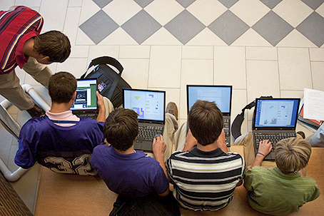 students and laptops